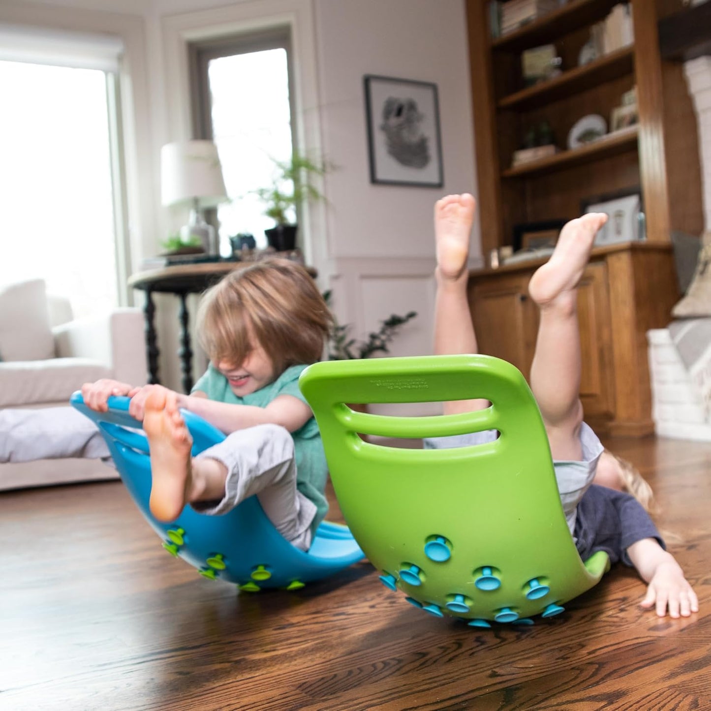 Curved Swing and Bounce Board—A board for children to swing, bounce, and practice balance