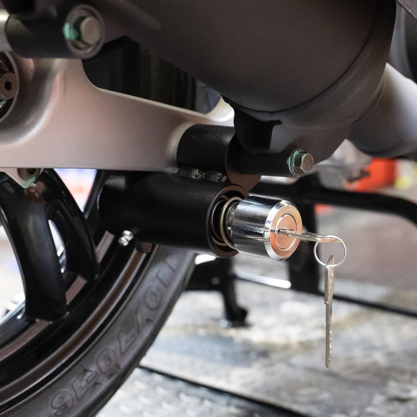 Foot-Activated Motorcycle Lock – Push to Lock, Key to Unlock