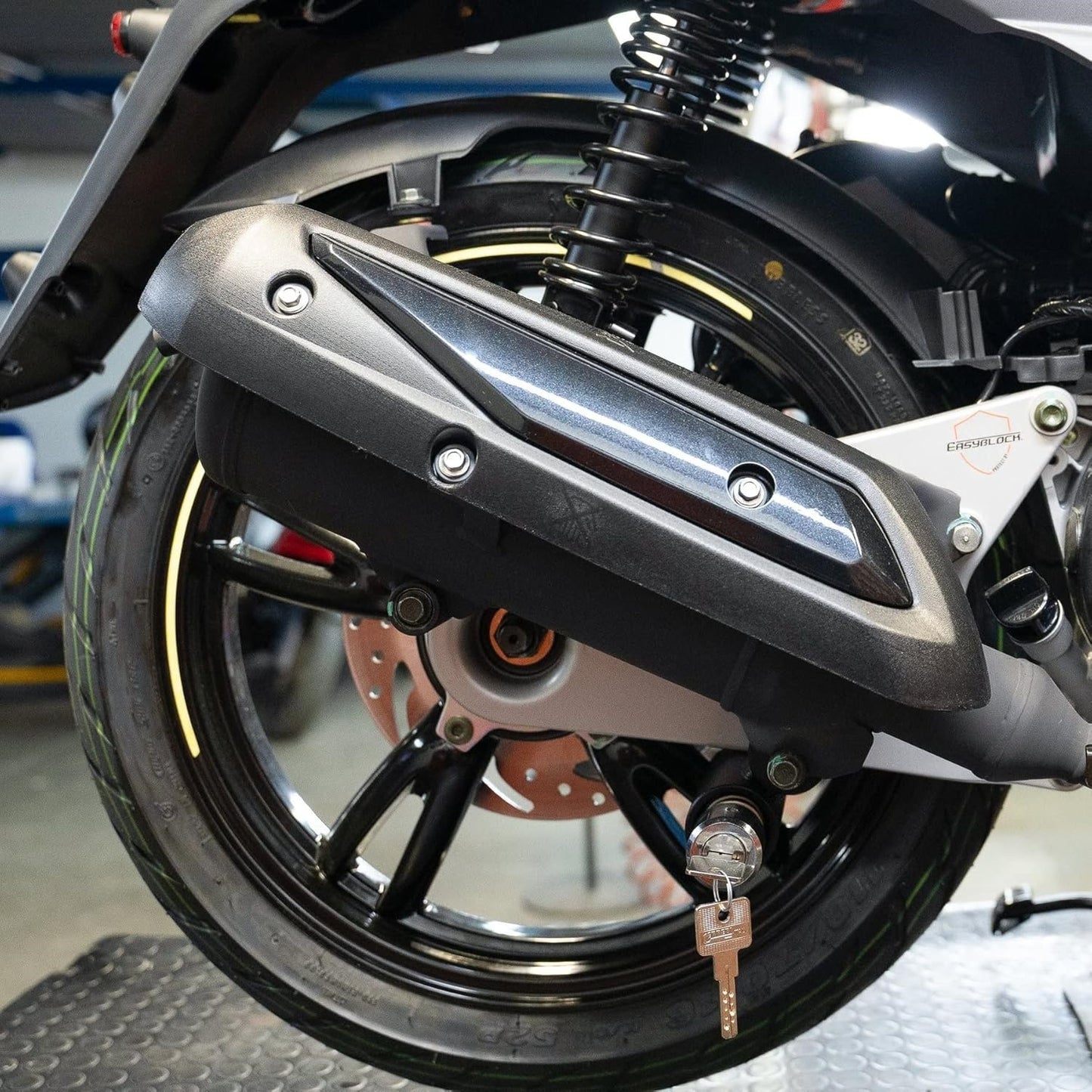 Foot-Activated Motorcycle Lock – Push to Lock, Key to Unlock